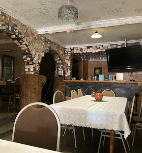 Wandies Place interior with note-covered walls